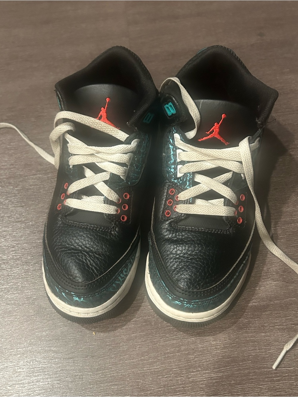Jordan Kids Black Sneakers with Teal and Red Accents